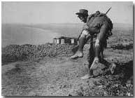 Australian soldier carrying wounded comrade, Gallipoli, 1915
