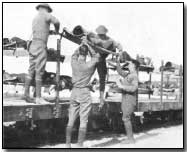 Wounded troops transported on flatbed rairoad cars