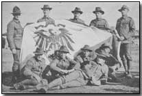 New Zealand Expeditionary Force with captured German flag from Samoa