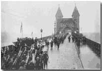 The 20th Battalion crossing the Rhine, 1918. ( Public Archives of Canada)